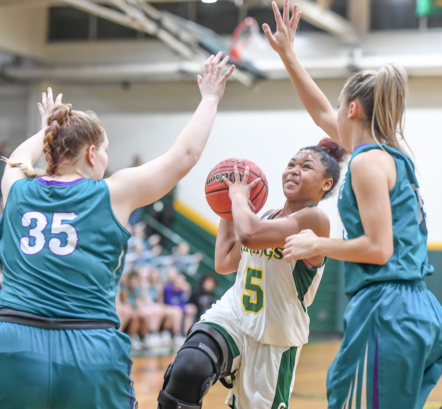 Friday night high school basketball action